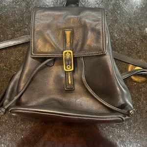 Black coach vintage genuine leather backpack.
